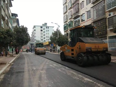 新田社區(qū)道路“白改黑”提質改造工程加速推進，通訊工程同步提升基建品質